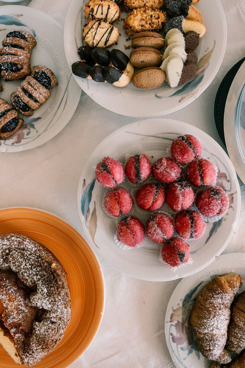 A variety of desserts on plates.