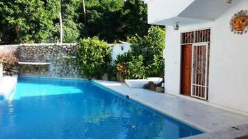 Outdoor pool, sun loungers