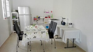 Family House, Multiple Beds | In-room dining - Apartamento PlayaDelCarmen 527 by Sinbad (Playa del Carmen)