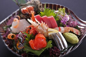 A variety of sushi and sashimi on a plate. - Taiza Onsen Sumihei (Kyotango)