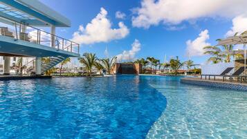 4 outdoor pools, open 9:00 AM to 7:00 PM, pool cabanas (surcharge)