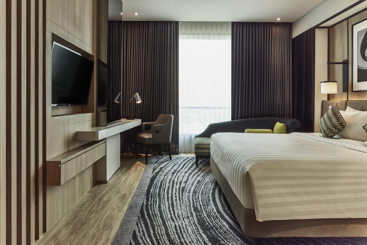 Habitación doble superior, 1 cama matrimonial | Minibar, caja de seguridad en la habitación y escritorio