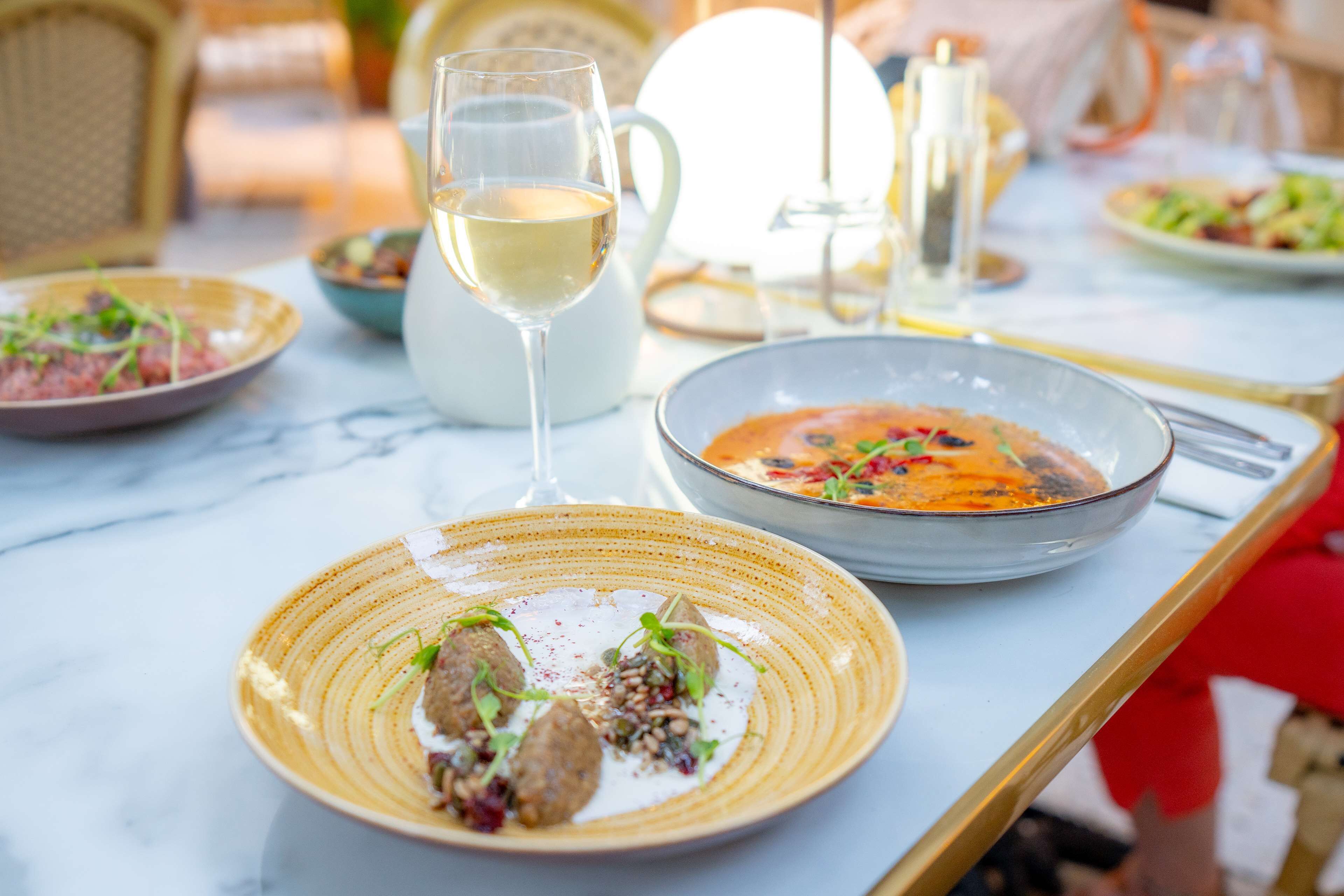 lunch, dinner served; regional cuisine, al fresco dining