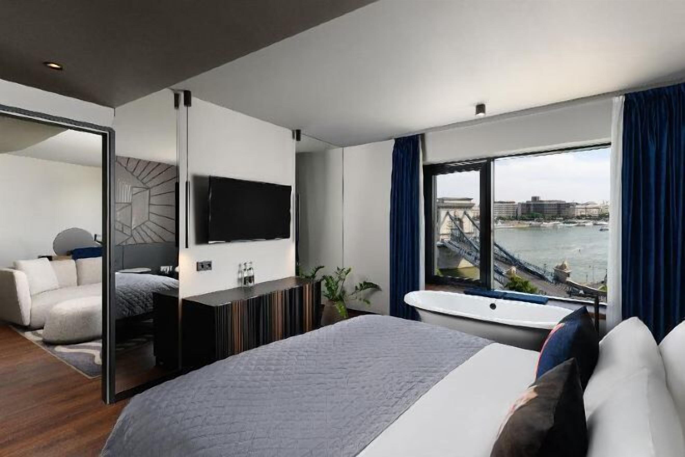 Ropa de cama de alta calidad, minibar, caja fuerte y cortinas opacas