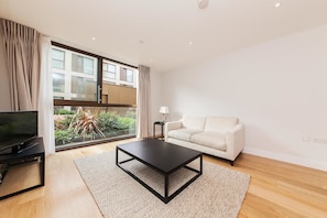 Apartment, 1 Bedroom | Living room | Flat-screen TV, Netflix