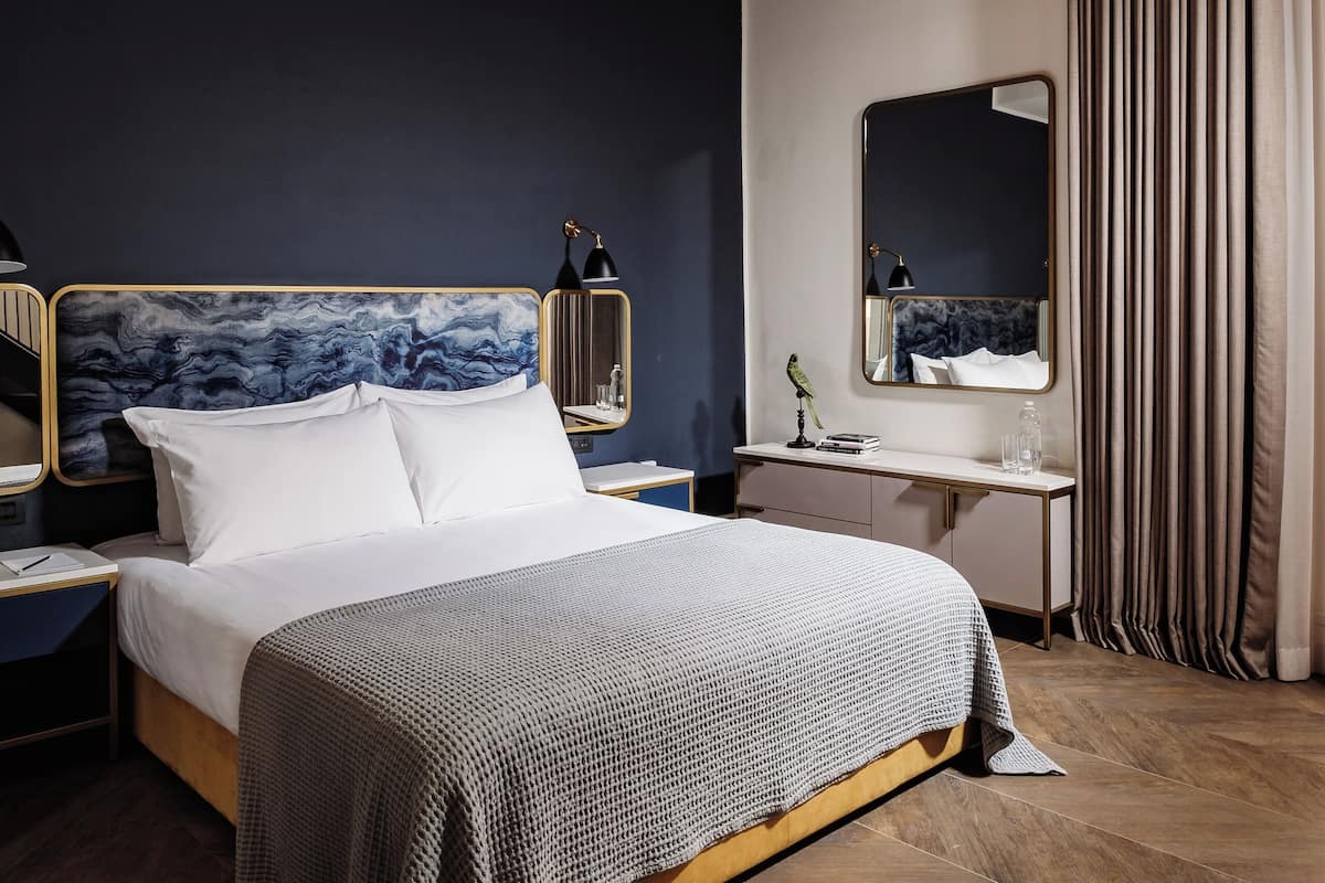 Suíte Júnior | Roupas de cama premium, frigobar, cofres nos quartos