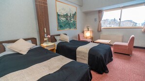 A hotel room with two beds, a desk, a chair, a window with a view, and a painting on the wall. - Shiga Grand Hotel (Yamanouchi)