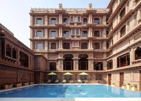 Indoor pool, sun loungers. Radisson Hotel Jodhpur