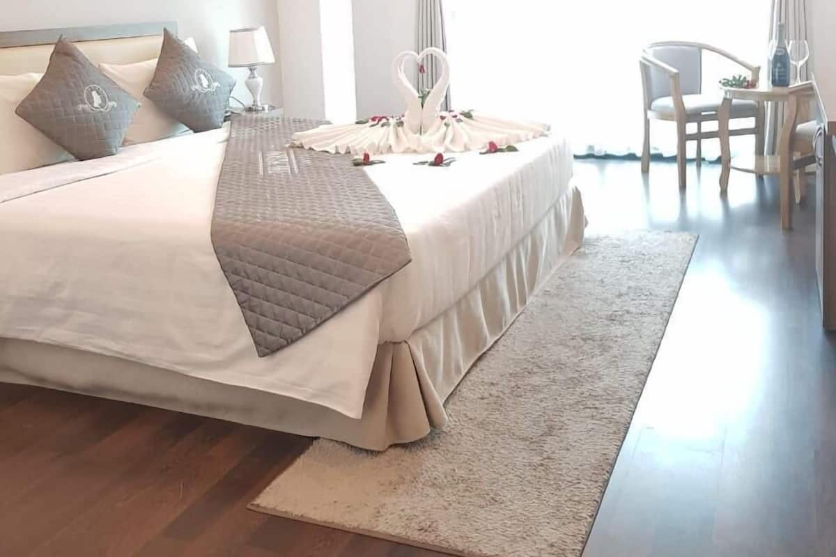 Deluxe Double Room, Balcony, City View | Minibar, in-room safe, desk, free WiFi