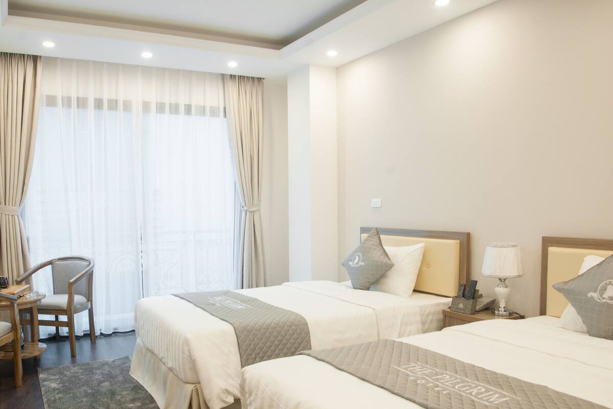 Deluxe Twin Room, Balcony, City View | Minibar, in-room safe, desk, free WiFi