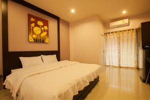 Superior Room | Minibar, desk, blackout drapes, rollaway beds - Chiang Kham Grand Villa (Chiang Kham)