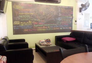 Lobby sitting area - Smile Capsule Hostel (Chiang Mai)