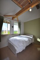 Triple Room, Non Smoking, Resort View | 1 bedroom, down comforters, free WiFi, bed sheets