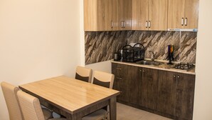 Comfort Apartment, 1 Bedroom, Non Smoking, Mountain View | In-room dining - Emirates Apartments (Batumi)