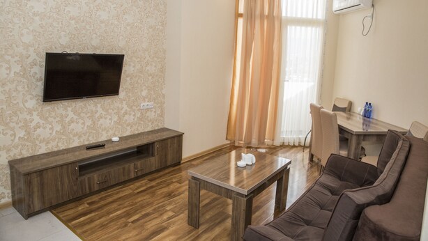 Comfort Apartment, 1 Bedroom, Non Smoking, Mountain View | Living area | Flat-screen TV - Emirates Apartments (Batumi)