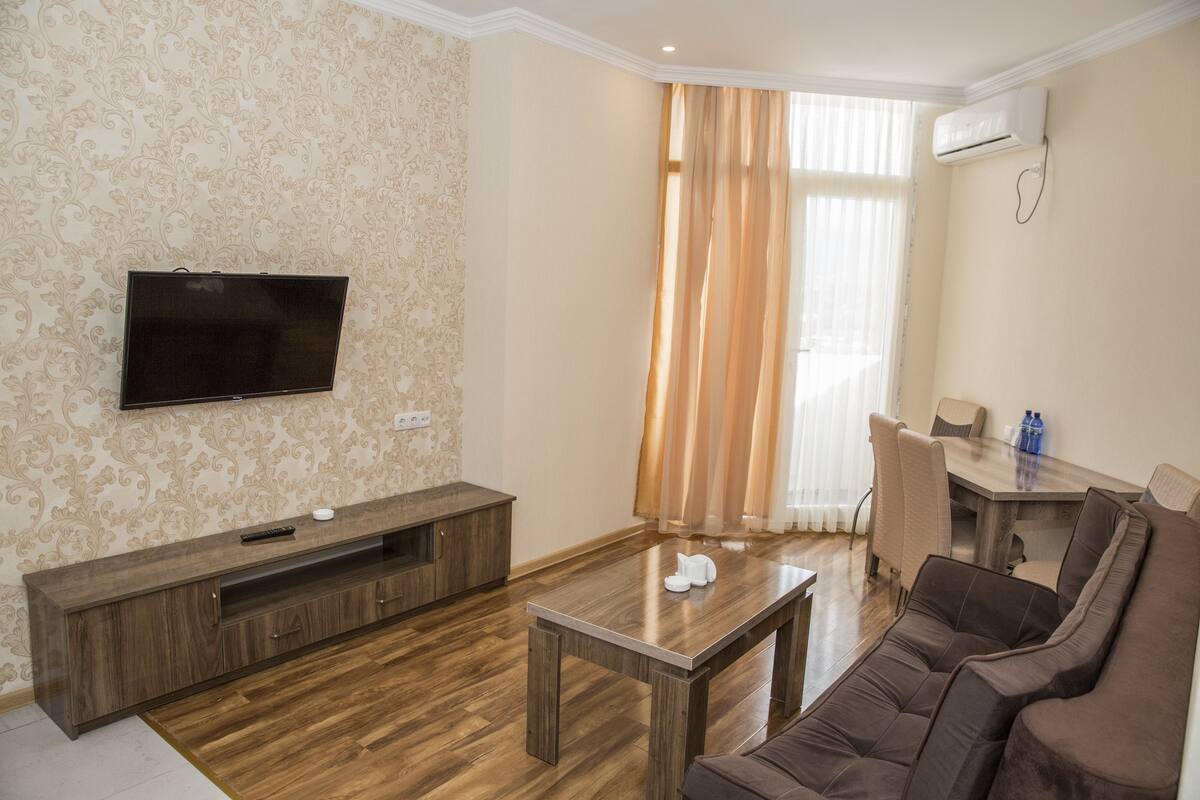 Appartement Confort, 1 chambre, non-fumeur, vue sur la montagne | Aire de séjour | Téléviseur à écran plat