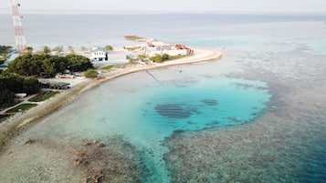 On the beach, beach umbrellas, beach towels, snorkelling