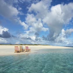 On the beach, beach umbrellas, beach towels, snorkelling