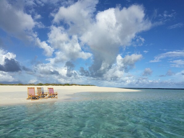 On the beach, beach umbrellas, beach towels, snorkelling