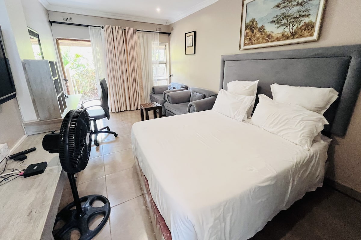 Deluxe Double Room | Individually furnished, desk, laptop workspace, blackout curtains
