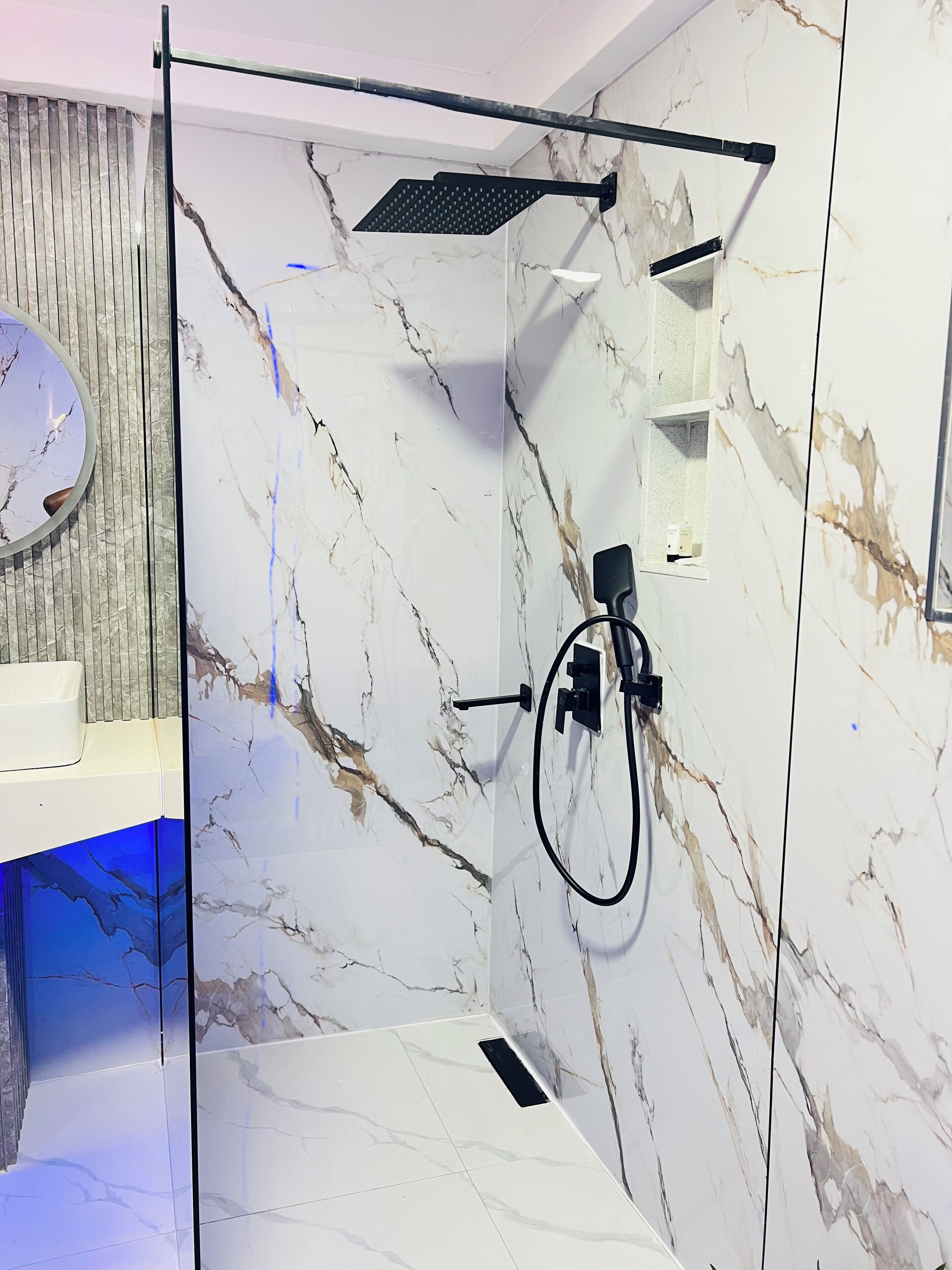 Designer toiletries, towels, soap, shampoo