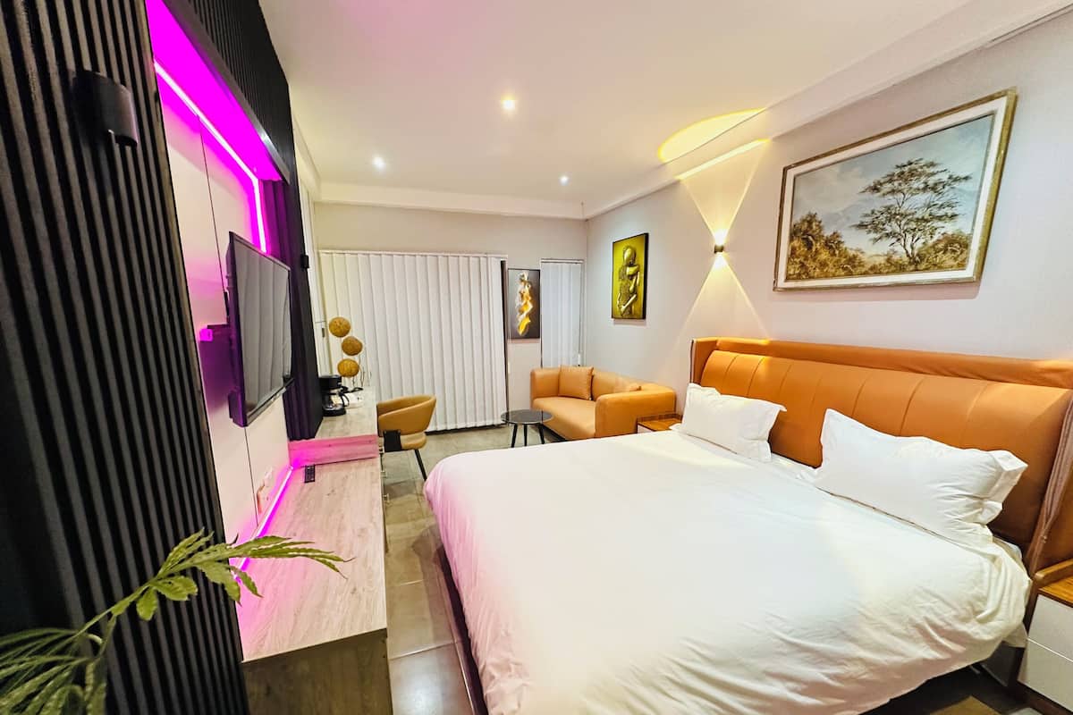 Deluxe Double Room | Individually furnished, desk, laptop workspace, blackout drapes