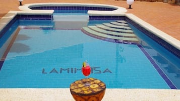 Outdoor pool, sun loungers
