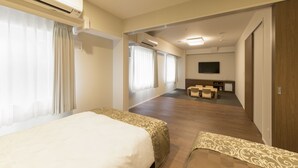 A hotel room with two beds, a TV, a seating area, and a large window. - SARASA HOTEL Shin-Osaka (Osaka)