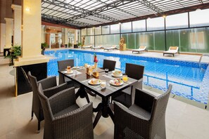 Indoor pool, open 6:00 AM to 8:00 PM, sun loungers