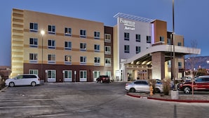 A multi-story Fairfield Inn & Suites by Marriott hotel with a parking lot and several cars parked in front. - Fairfield Inn & Suites by Marriott Albuquerque North (Albuquerque)