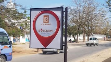 Basic Double Room, Private Bathroom, Garden Area | Living area | Flat-screen TV