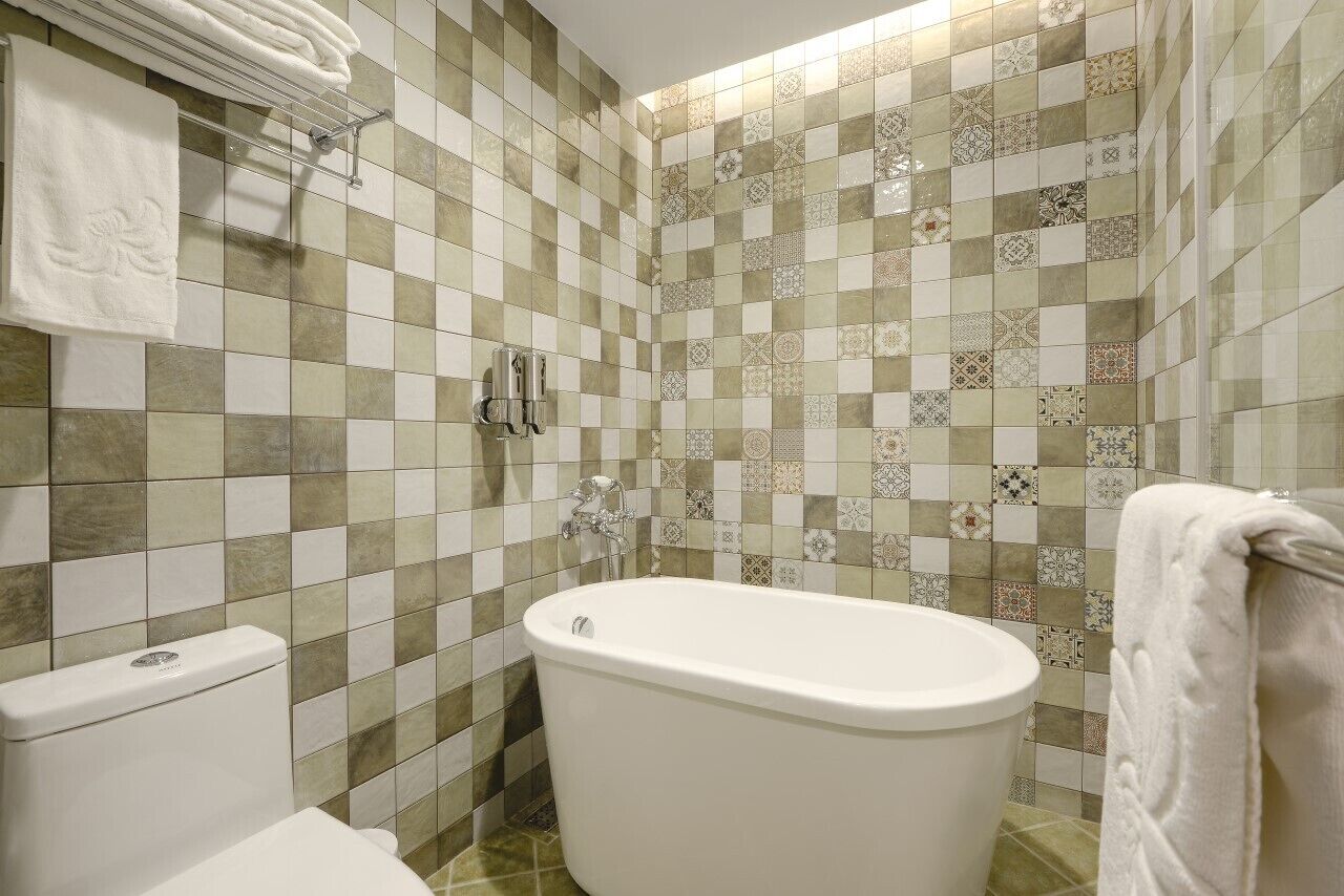 deluxe double room, balcony | deep-soaking bathtub