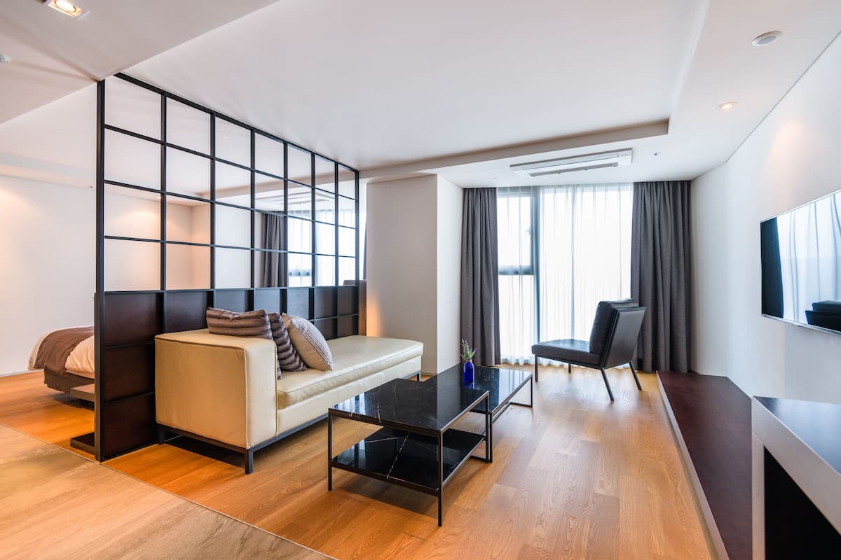 Premium Suite, City View (Not allowed to cook) | Living area | 47-inch flat-screen TV with cable channels, TV