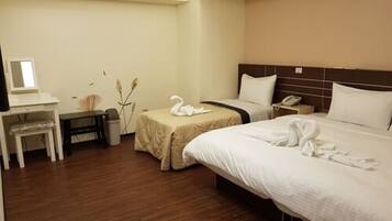 Standard Triple Room, 1 Bedroom | Minibar, blackout drapes, soundproofing, free WiFi