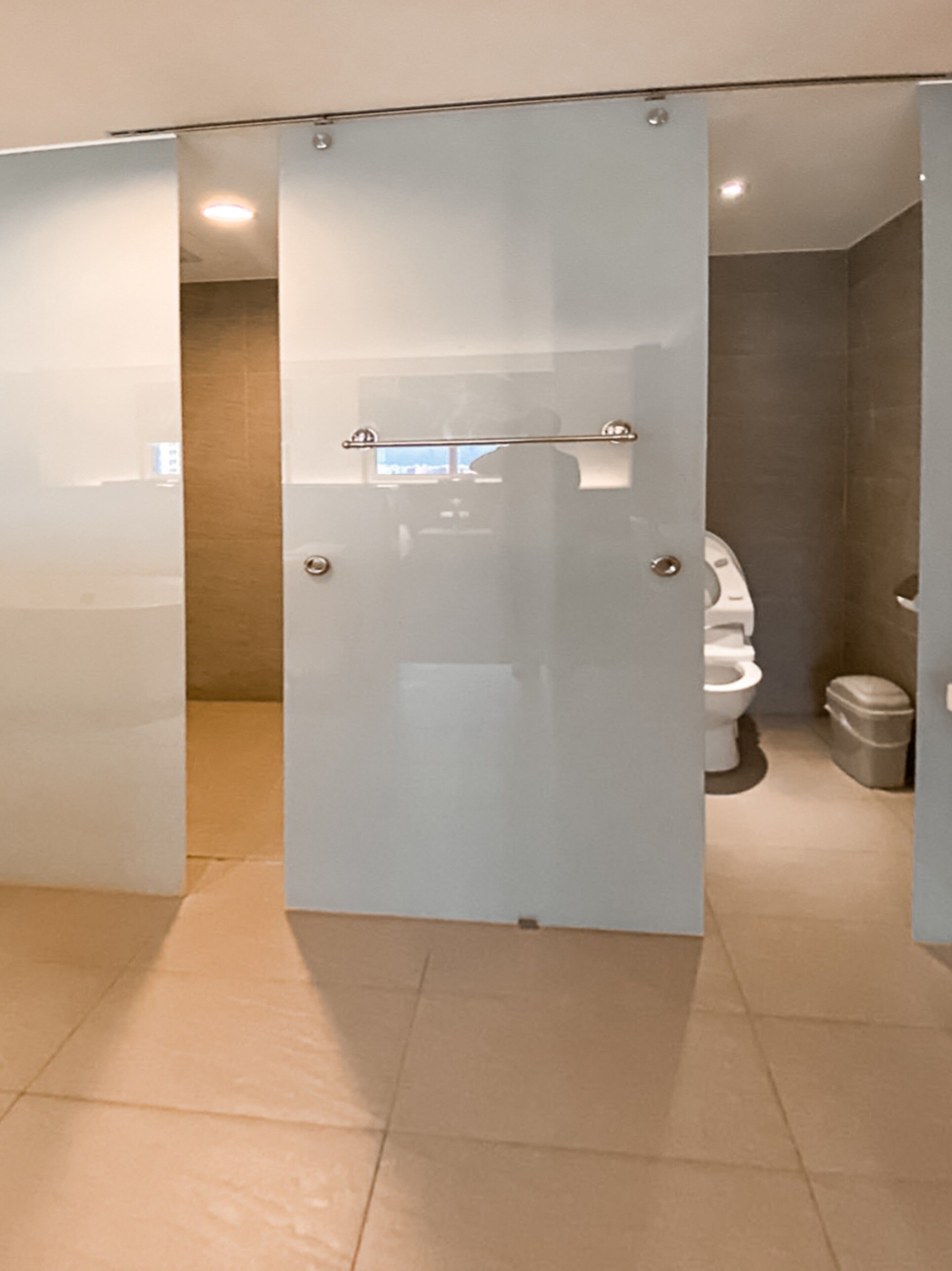 deluxe suite | bathroom | shower, rainfall showerhead, hair dryer, towels