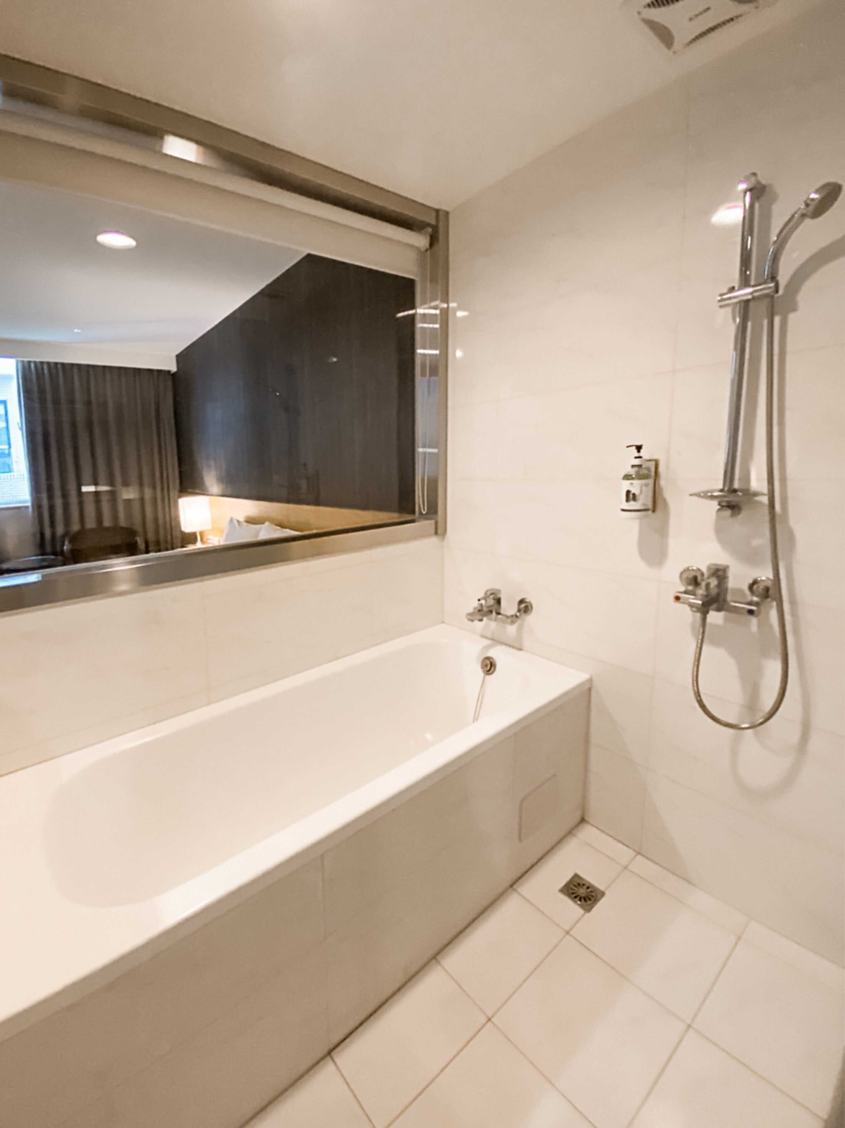 standard double room | bathroom | shower, rainfall showerhead, hair dryer, towels