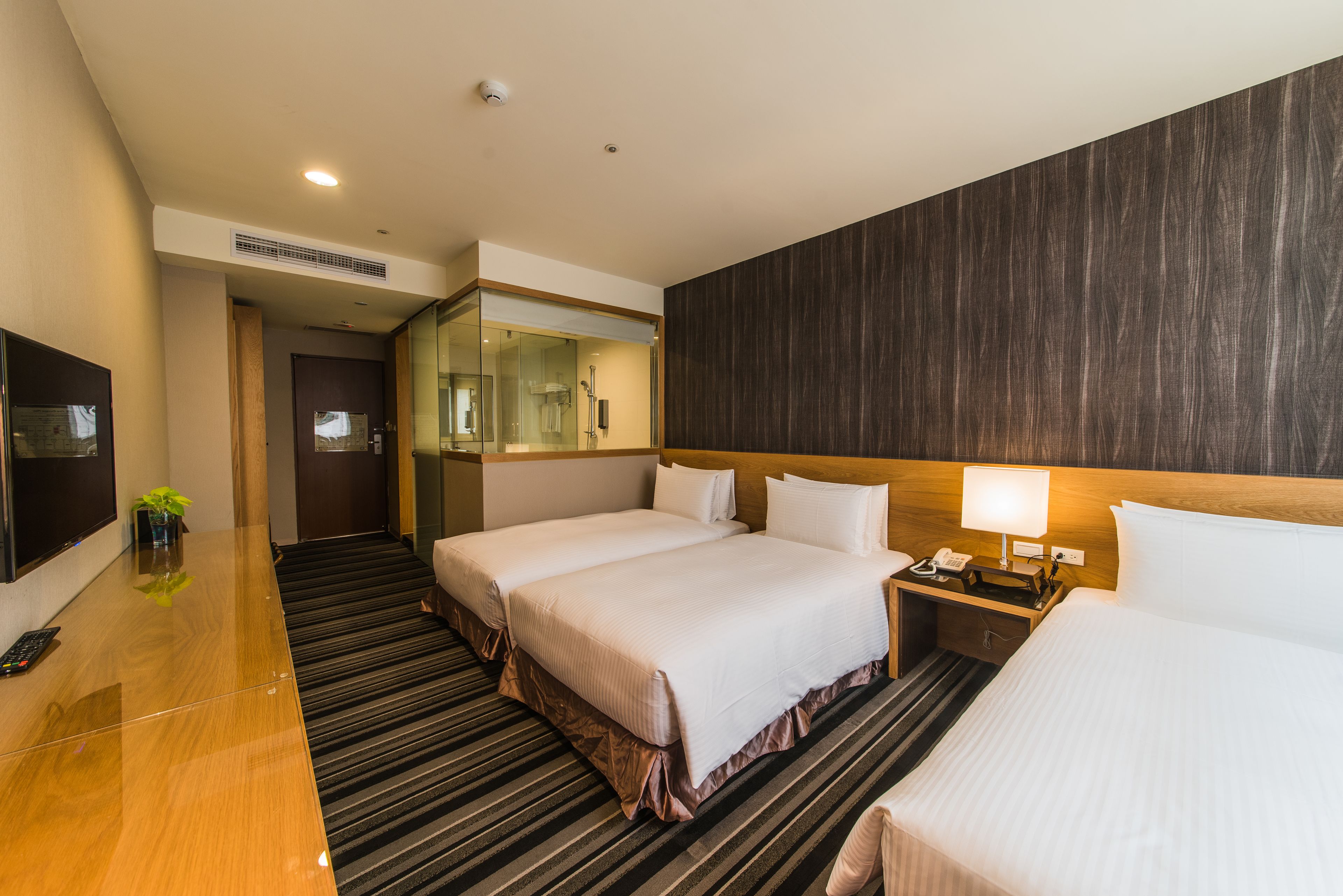 deluxe triple room | 1 bedroom, desk, laptop workspace, soundproofing