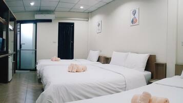 Family Quadruple Room, Multiple Beds | Desk, laptop workspace, blackout curtains, free WiFi