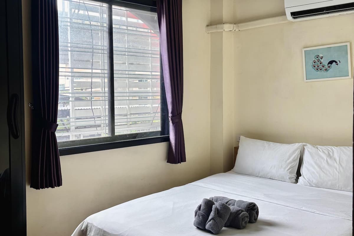 Desk, laptop workspace, blackout curtains, free WiFi