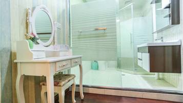 Shower, free toiletries, hair dryer, slippers