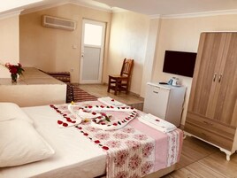 Ropa de cama de alta calidad, minibar y decoración personalizada 