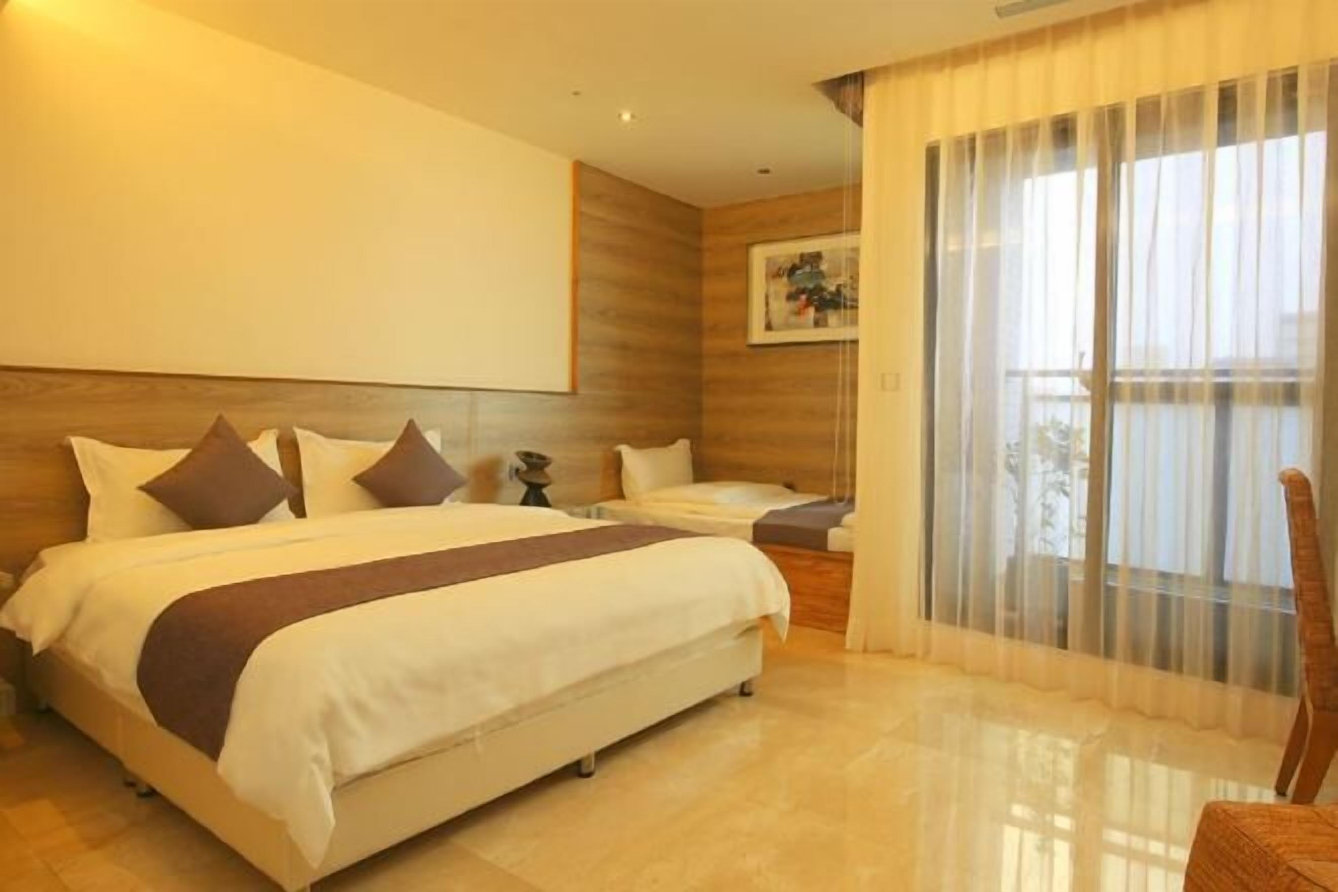 Premium bedding, down duvets, in-room safe, desk