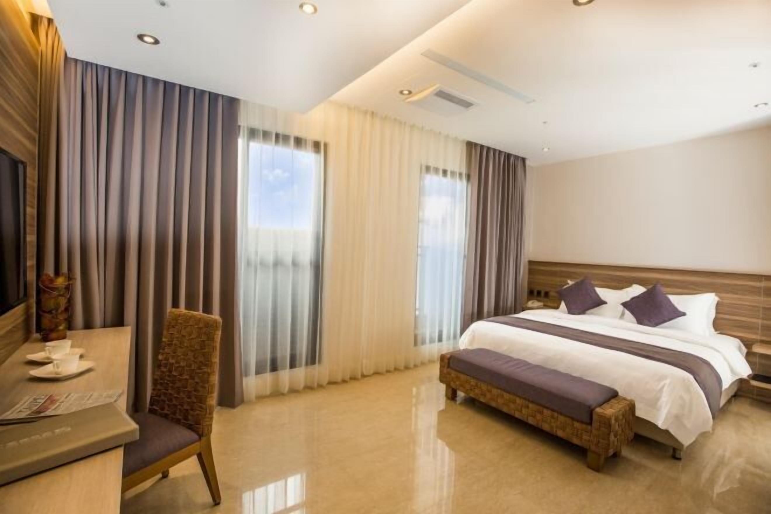 Premium bedding, down duvets, in-room safe, desk