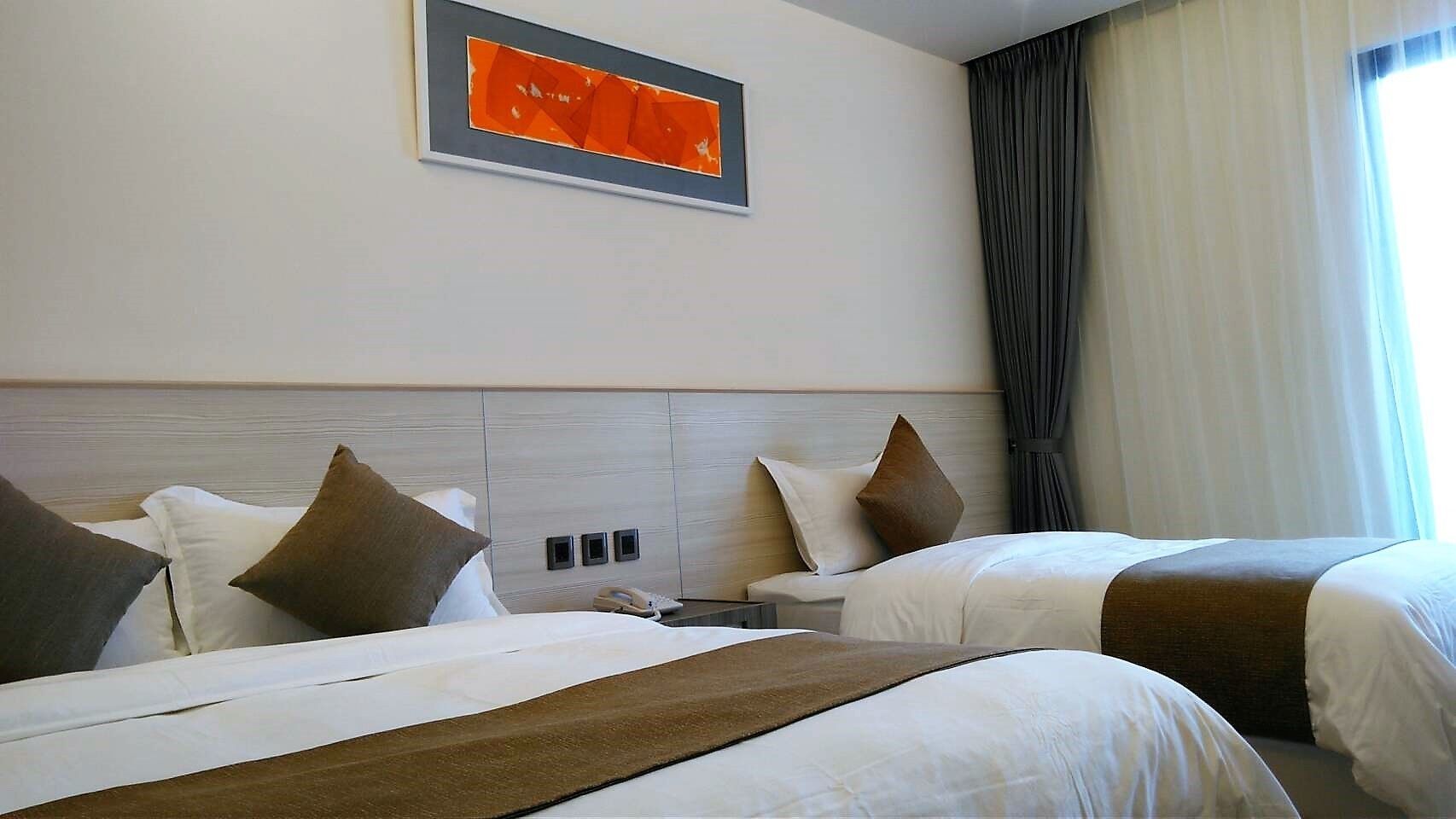deluxe triple room, multiple beds, balcony, tower | 1 bedroom, premium bedding, down duvets, in-room safe