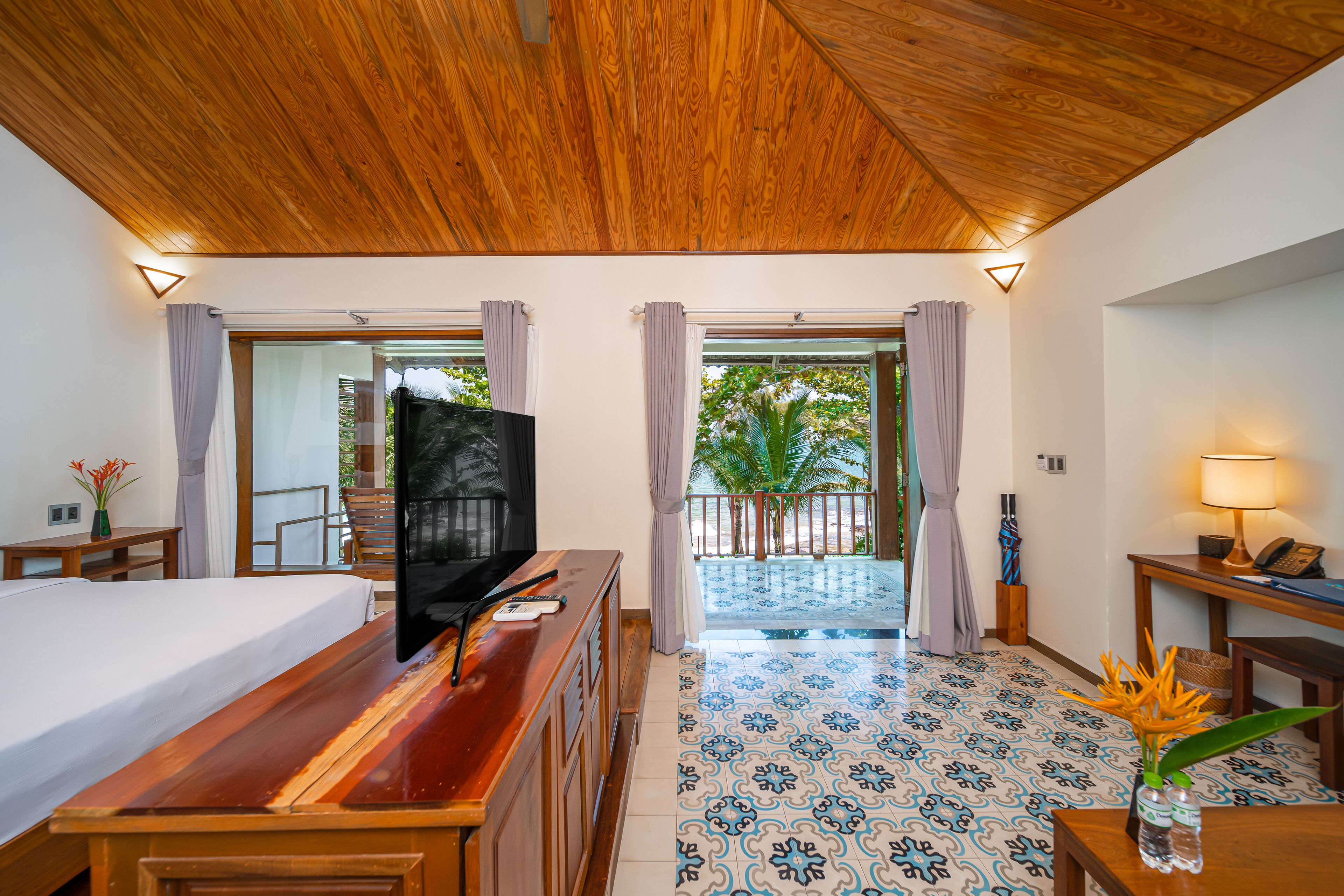 villa, beachfront | living area | 40-inch lcd tv with cable channels, tv