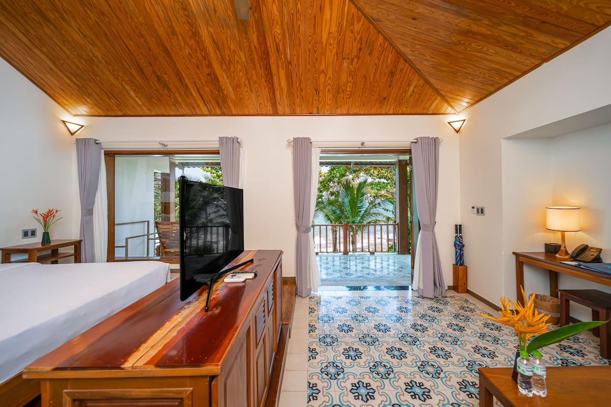 villa, beachfront | living area | 40-inch lcd tv with cable channels, tv