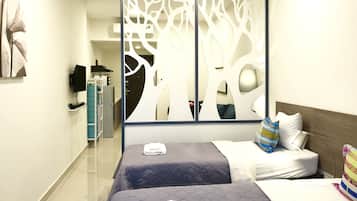 Apartment, City View | In-room safe, desk, laptop workspace, iron/ironing board