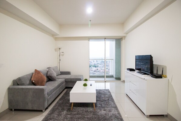 Living area - 2 BR Best in Kelapa Gading Sherwood Apartment By Travelio (Jakarta)