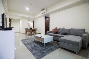 Living area - 2 BR Best in Kelapa Gading Sherwood Apartment By Travelio (Jakarta)