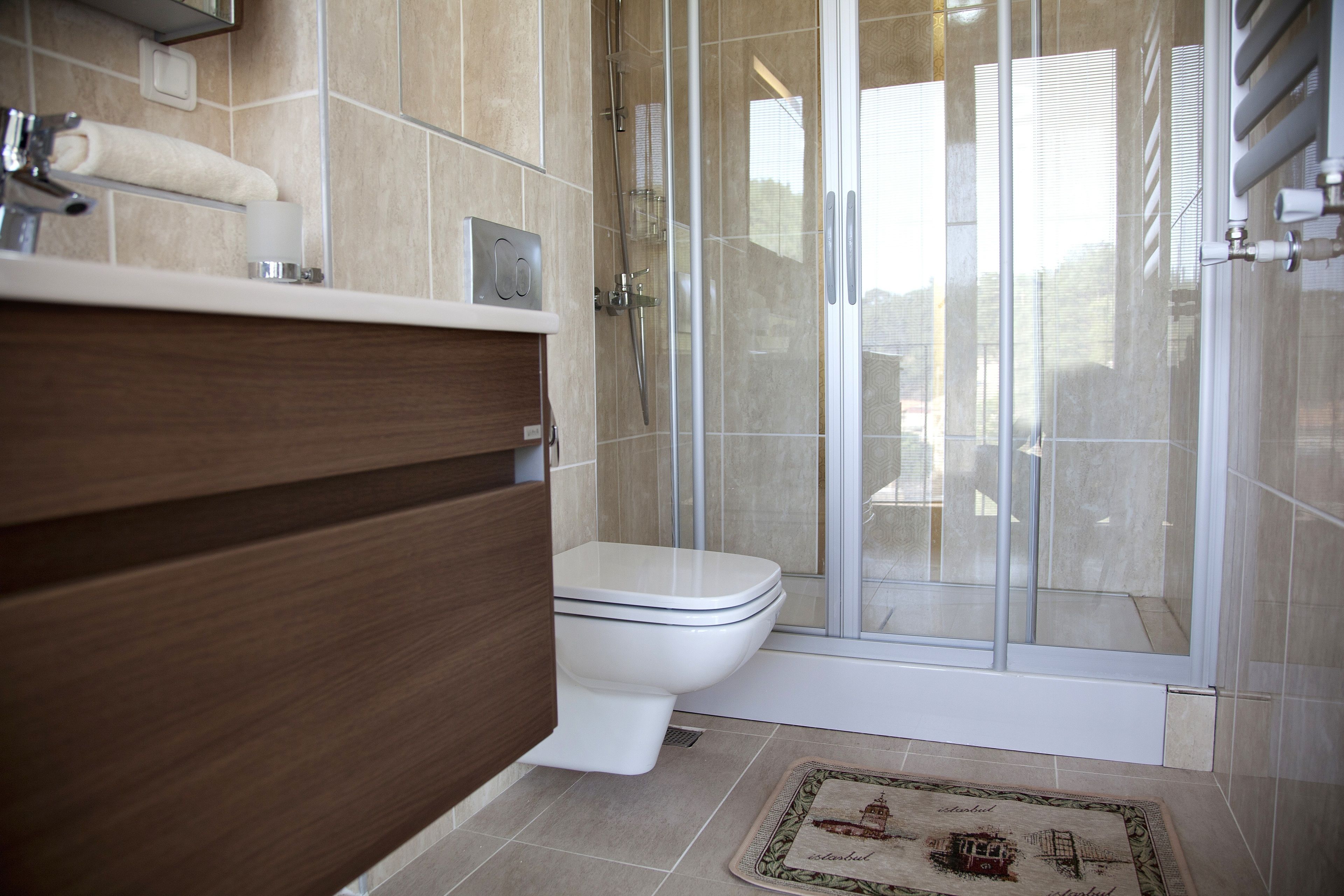 shower, designer toiletries, hair dryer, bathrobes